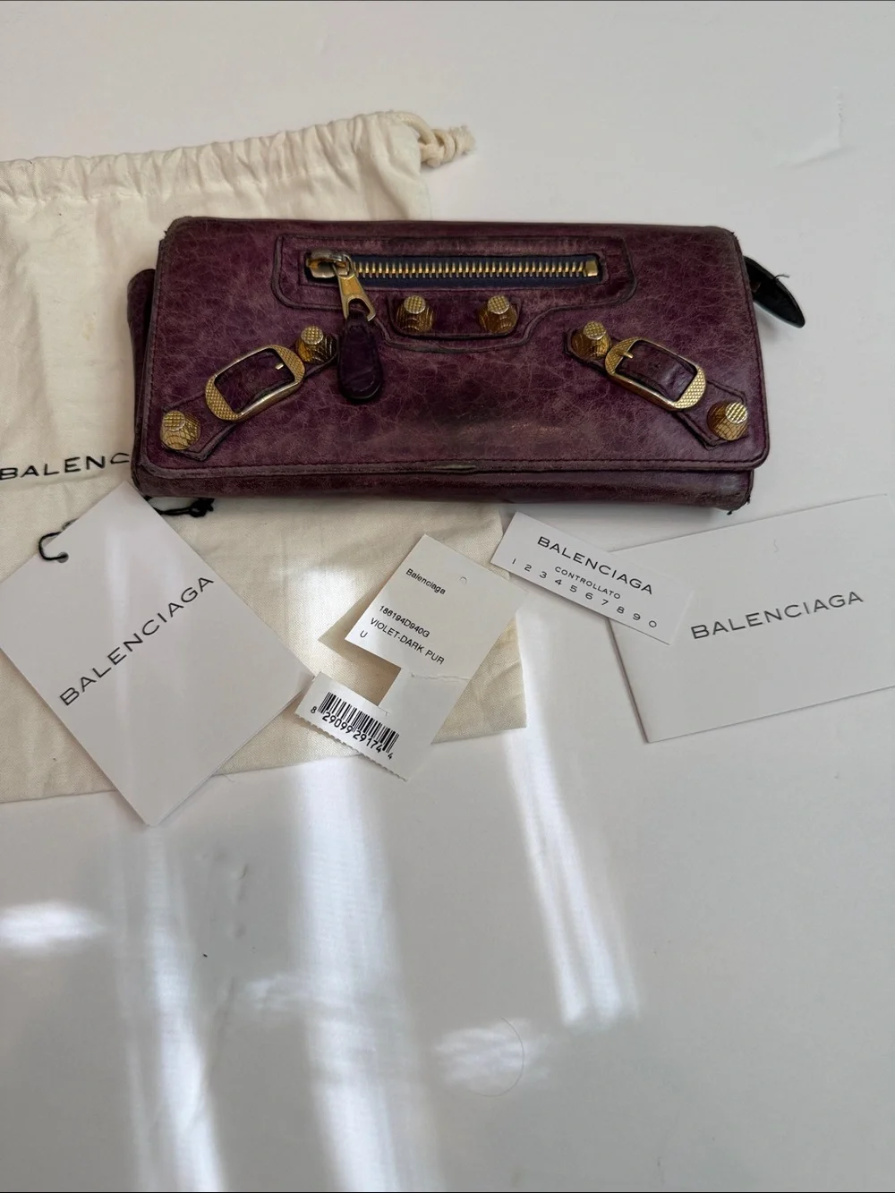 Balenciaga Distressed Plum Leather Continental Wallet with Gold Hardware